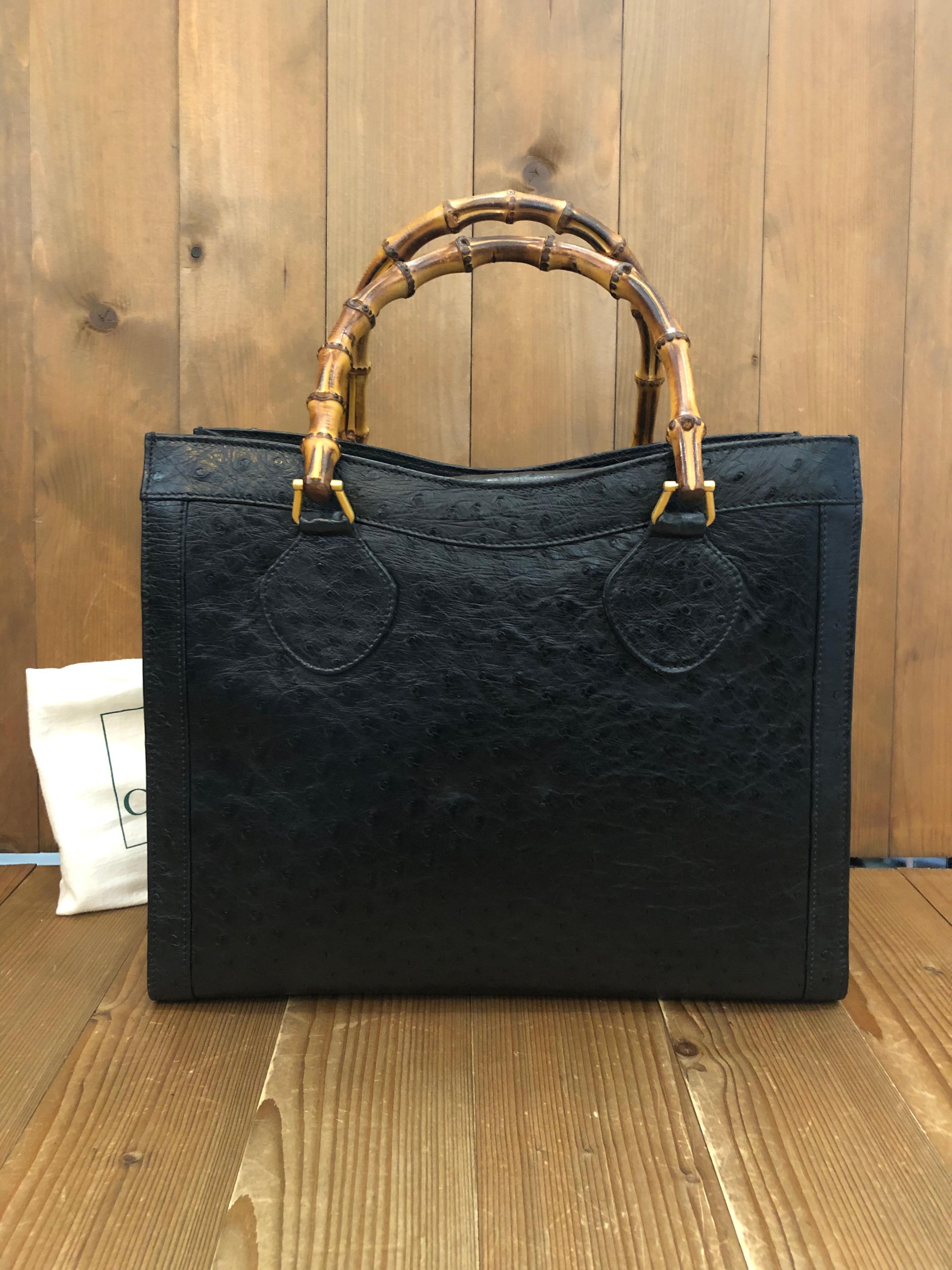 This vintage GUCCI Diana bamboo tote is crafted of exotic ostrich skin in black featuring matt gold toned hardware. This ostrich tote features hidden top flap magnetic snap closure that opens to a black suede interior with two main compartments/one