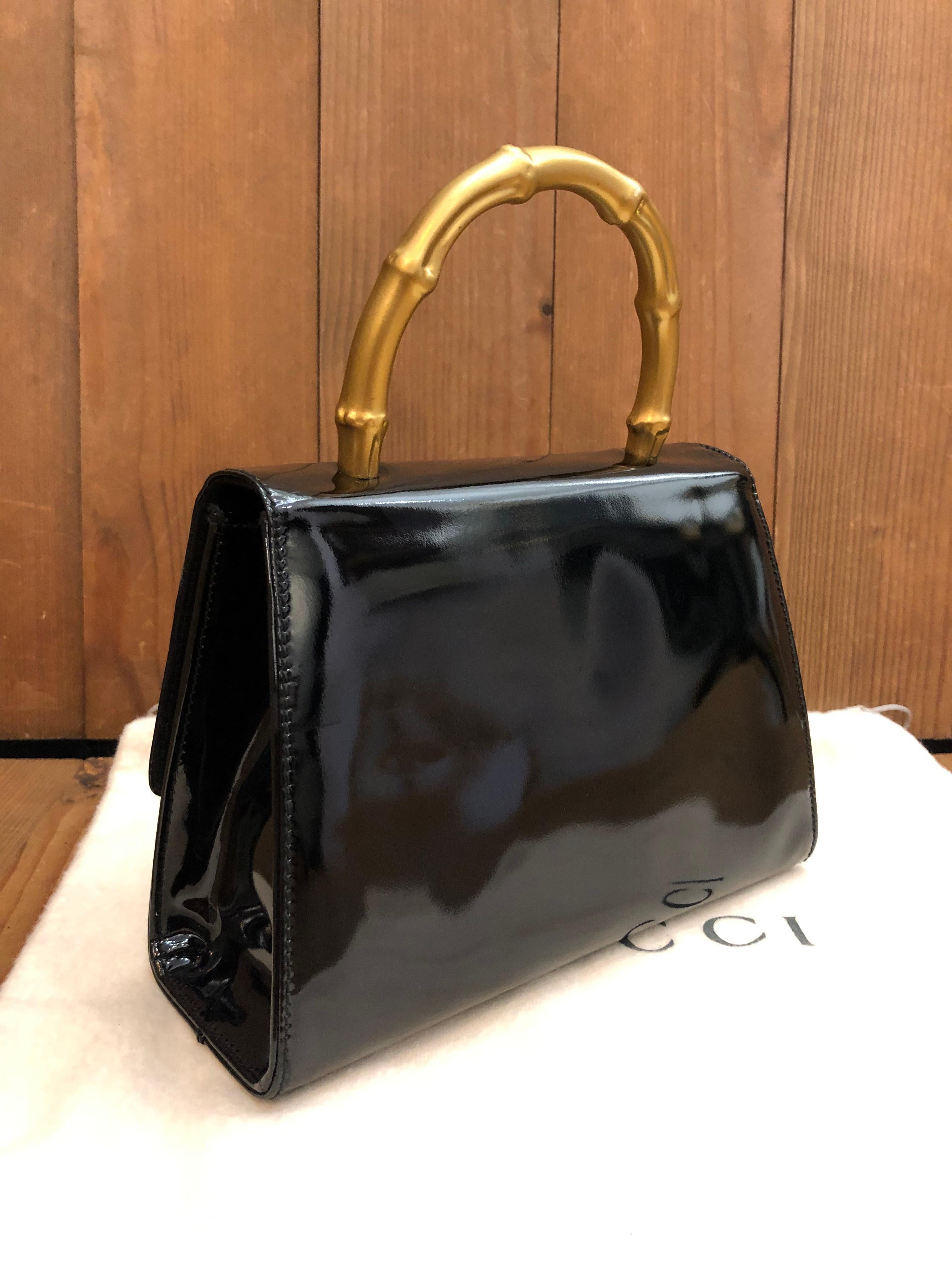Women's or Men's 1990s Vintage GUCCI Mini Gold Bamboo Ring Hand Bag Patent Leather Black For Sale