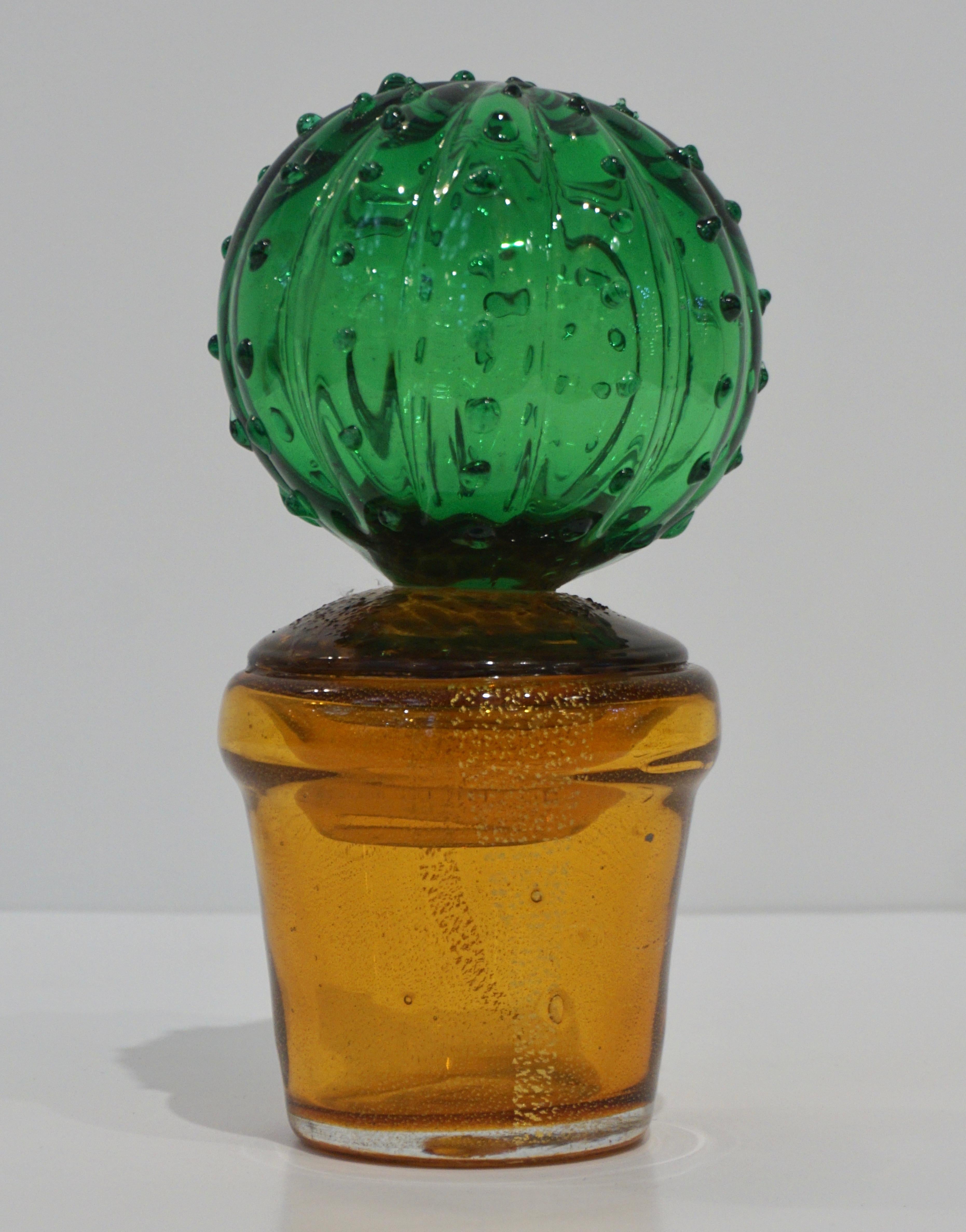 1990s Italian highly collectible Venetian glass cactus of limited edition, entirely handcrafted in Murano, with modern Minimalist design blown by Formia, in a lifelike organic modernist shape in blown transparent vivid green Murano glass highlighted