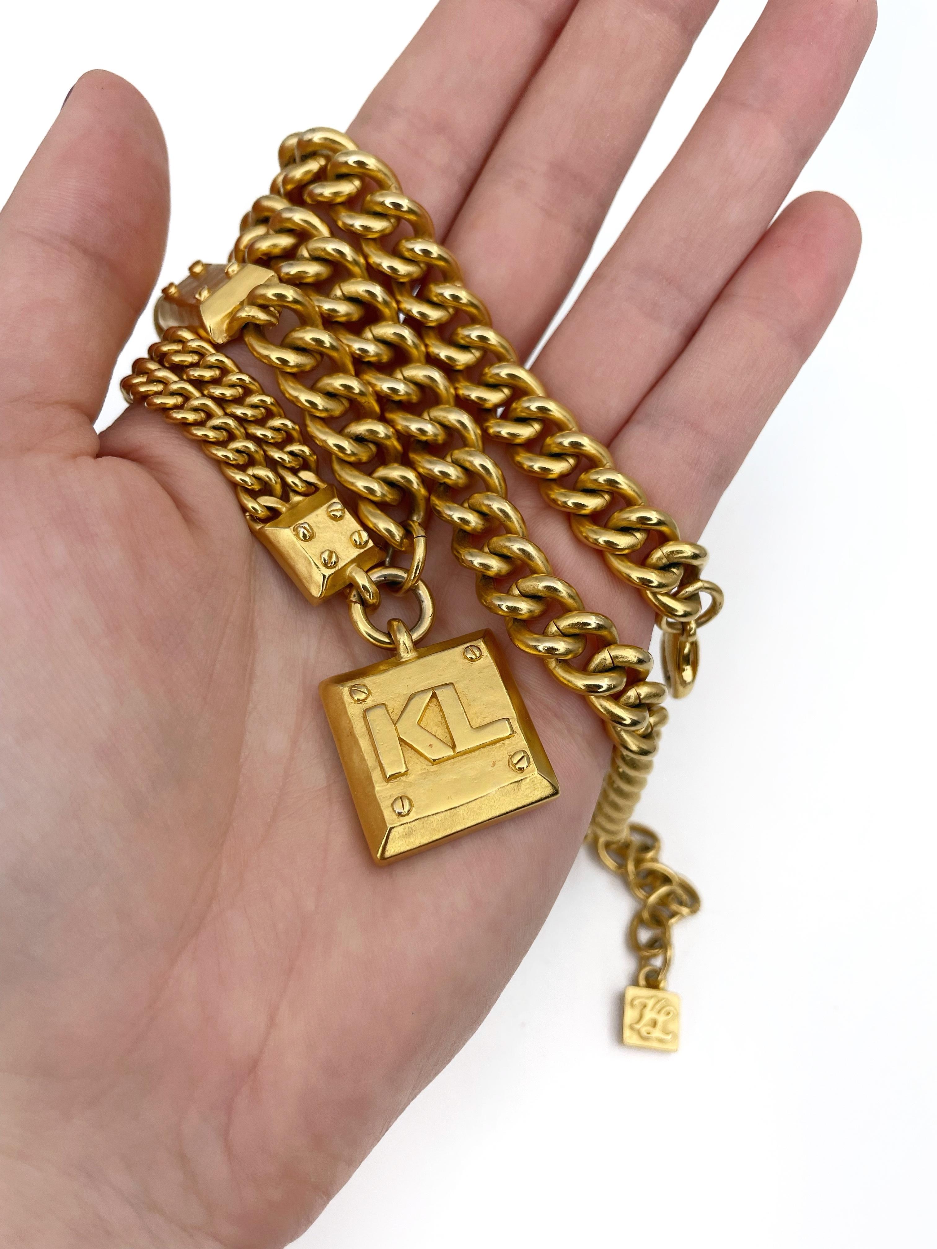 This is a beautiful and stylish massive chain necklace designed by Karl Lagerfeld in 1990’s. This piece is gold plated. The length can be adjusted to several options.

Signed: 