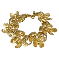 1990s Vintage Lanvin Gold Tone Floral Design Bracelet