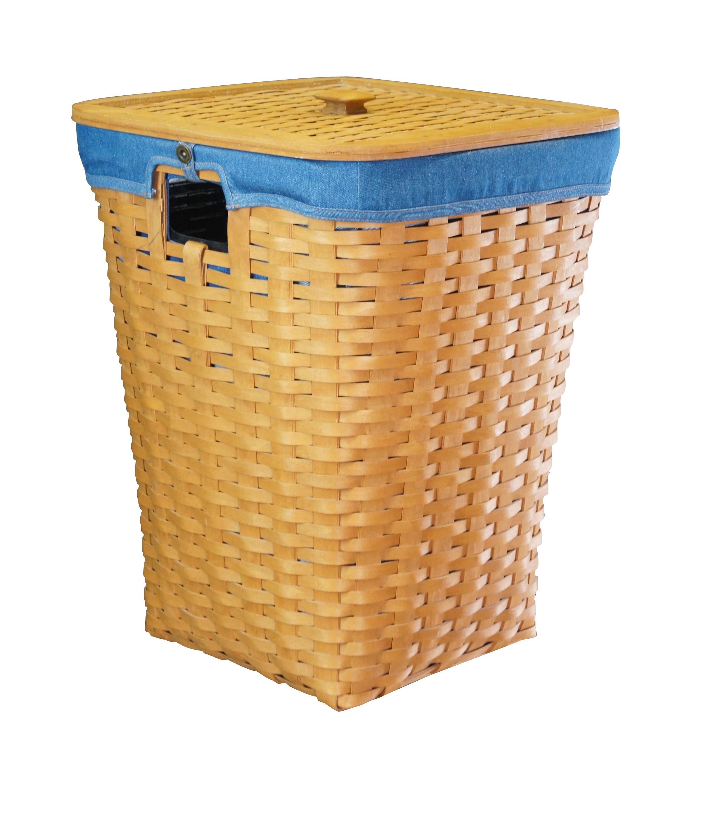 Longaberger woven hamper, circa 1993.  Features a denim liner and plastic insert.  Includes lid.

Dimensions: 
17