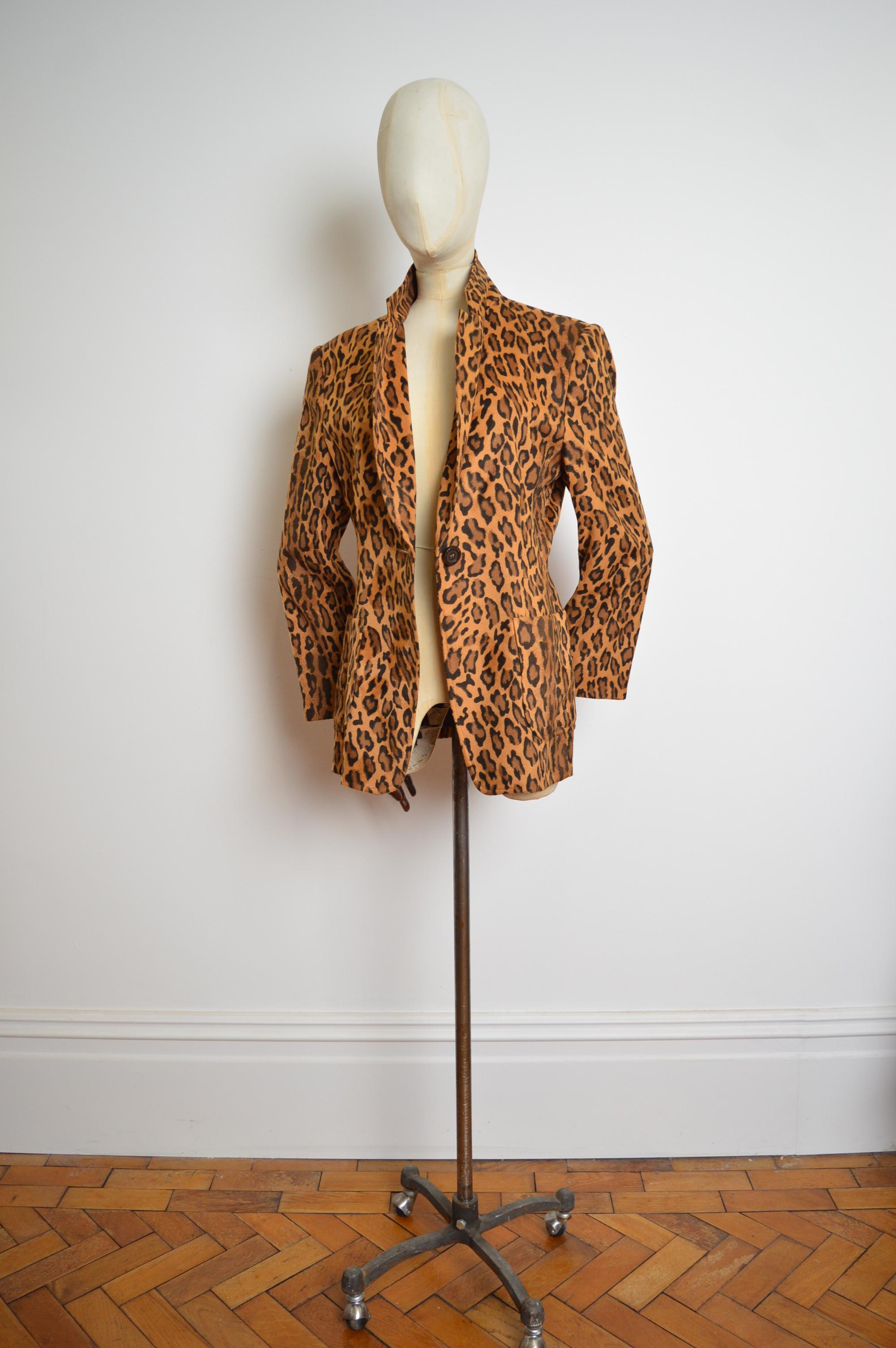 1990’s Soft felted texture Leopard print Blazer designed by Franco Moschino !
MADE IN ITALY.
Fully lined 
Hip pockets
Size; Best fits U.K. 10-12 (Label states U.K. 16 however the garment comes up smaller)
Pit to Pit; 19”
Pit to Cuff; 18”
Nape to