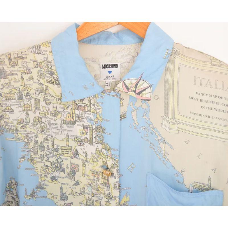 Vintage 1990's Moschino short sleeved shirt, depicting maps of Italy, with intricate regional details. 

Lets face it Italians do it better !

Features:
Central line button fasten
Chest pocket
Loose fit
Gold Metal Moschino Buttons

100%