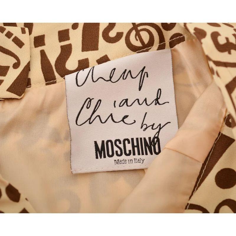 1990er Jahre Vintage Moschino Punctuation Symbol Cheap and Chic Cremefarbener Minirock Damen im Angebot