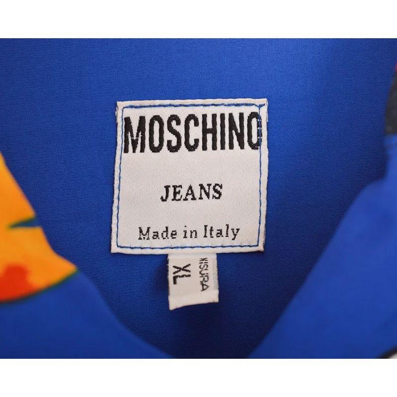 1990's Vintage Moschino Smiley Rave Face & Suns Pattern Short sleeve Blue Shirt In Excellent Condition For Sale In Sheffield, GB