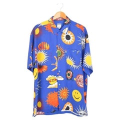 1990's Vintage Moschino Smiley Rave Face & Suns Pattern Short sleeve Blue Shirt
