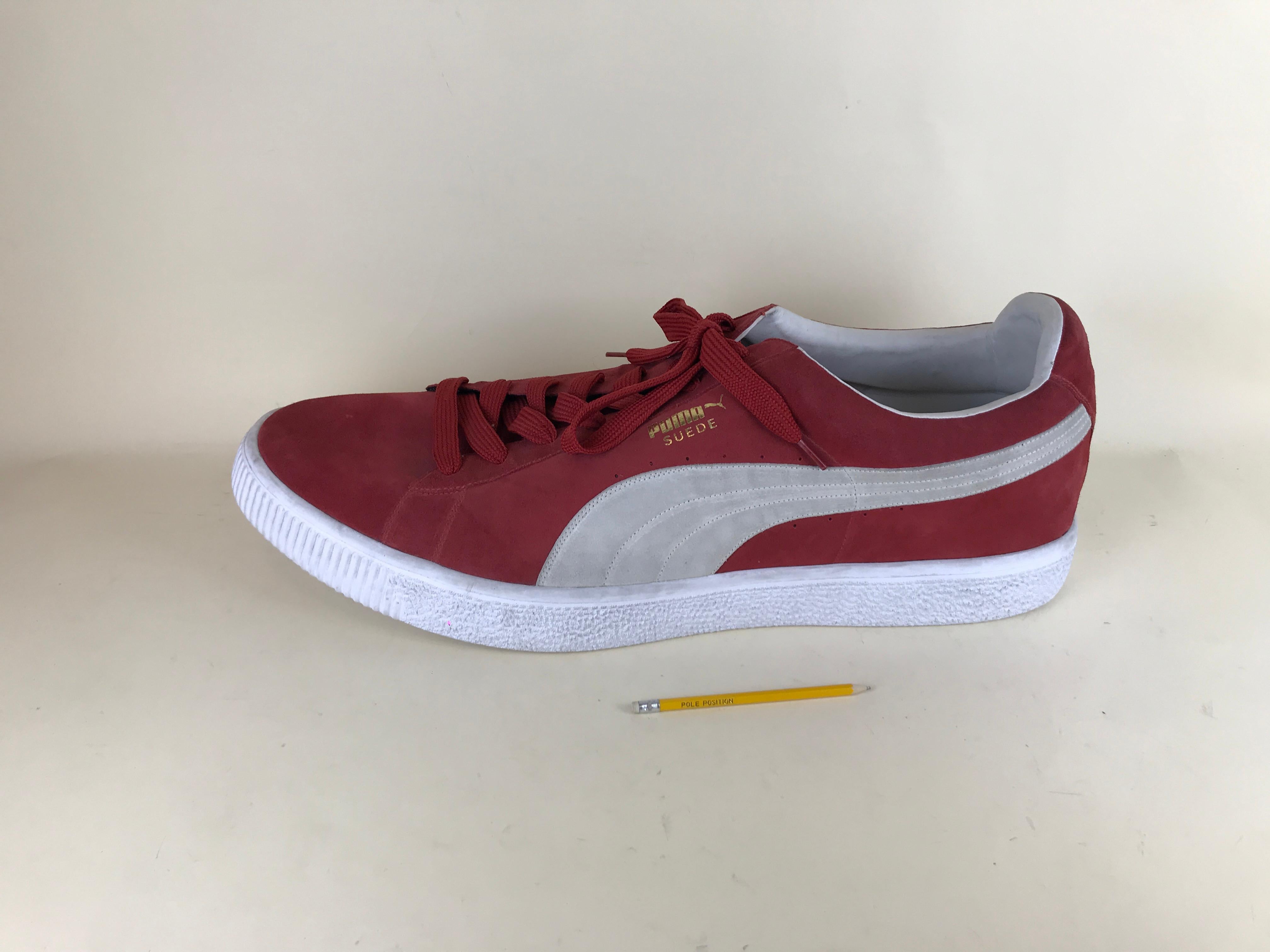 Very large window display prop used in the 1990s to advertise the Suede model by Puma originally launched in 1968.

The single model of shoe is in red measuring 63 L x 21 W x 22 H cm.
 