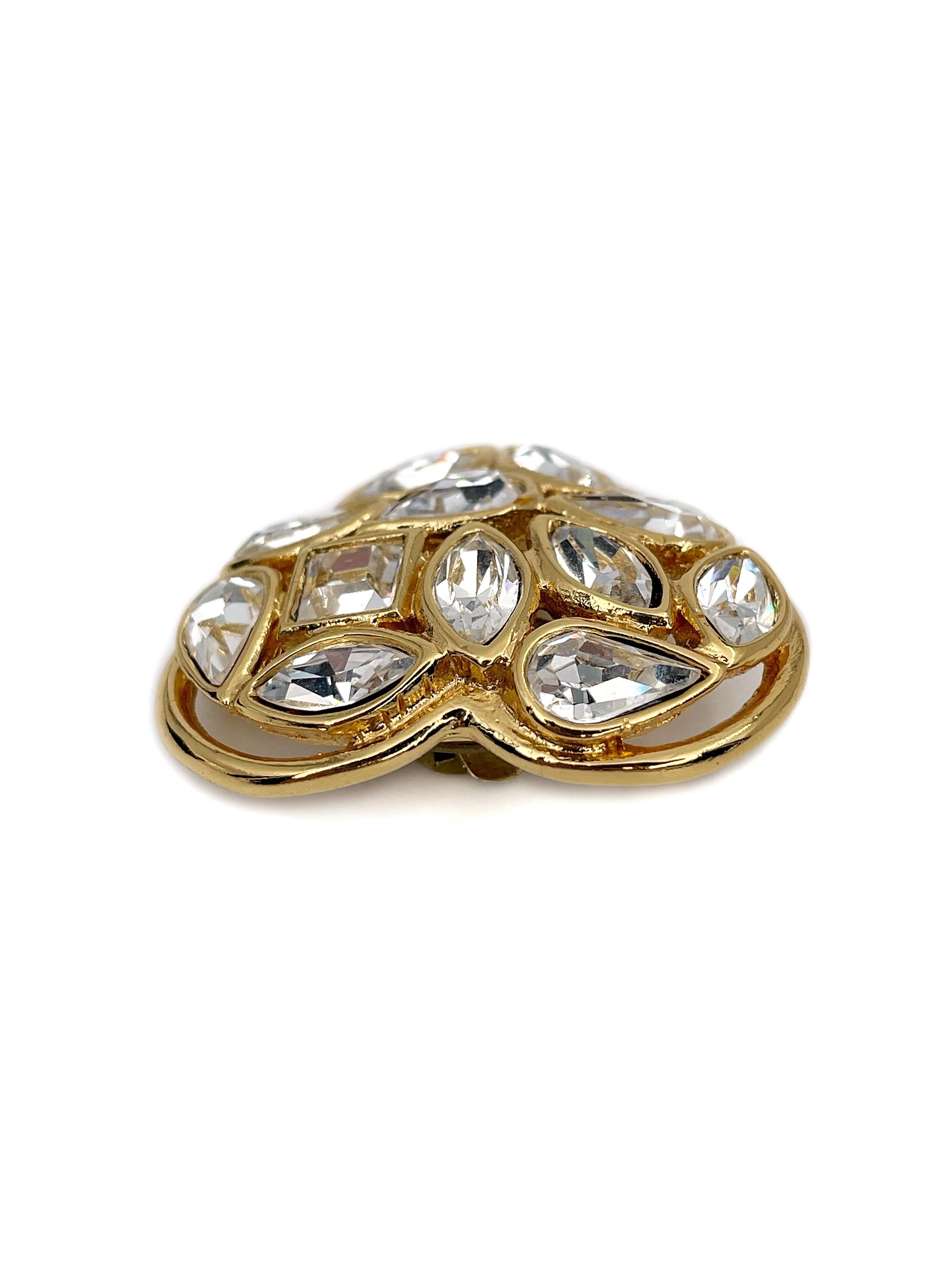 This is a gold tone vintage heart pin designed by Robert Goosens for YSL in 1990’s. This piece is gold plated. It features clear shiny rhinestones.

Signed: 
