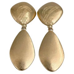 1990s Vintage Yves Saint Laurent Gold Tone Textured Long Clip-On Earrings