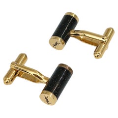 Gemelli vintage degli anni '90 di Yves Saint Laurent (YSL) in resina nera con barra a T e finitura dorata
