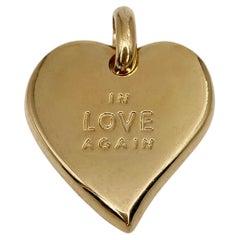Yves Saint Laurent Pendentif vintage YSL « Love Again » en forme de cœur, couleur or, années 1990