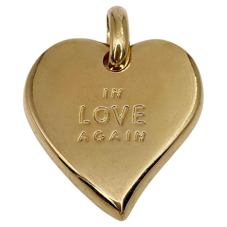 Yves Saint Laurent 1990s Gold Heart Earrings · INTO
