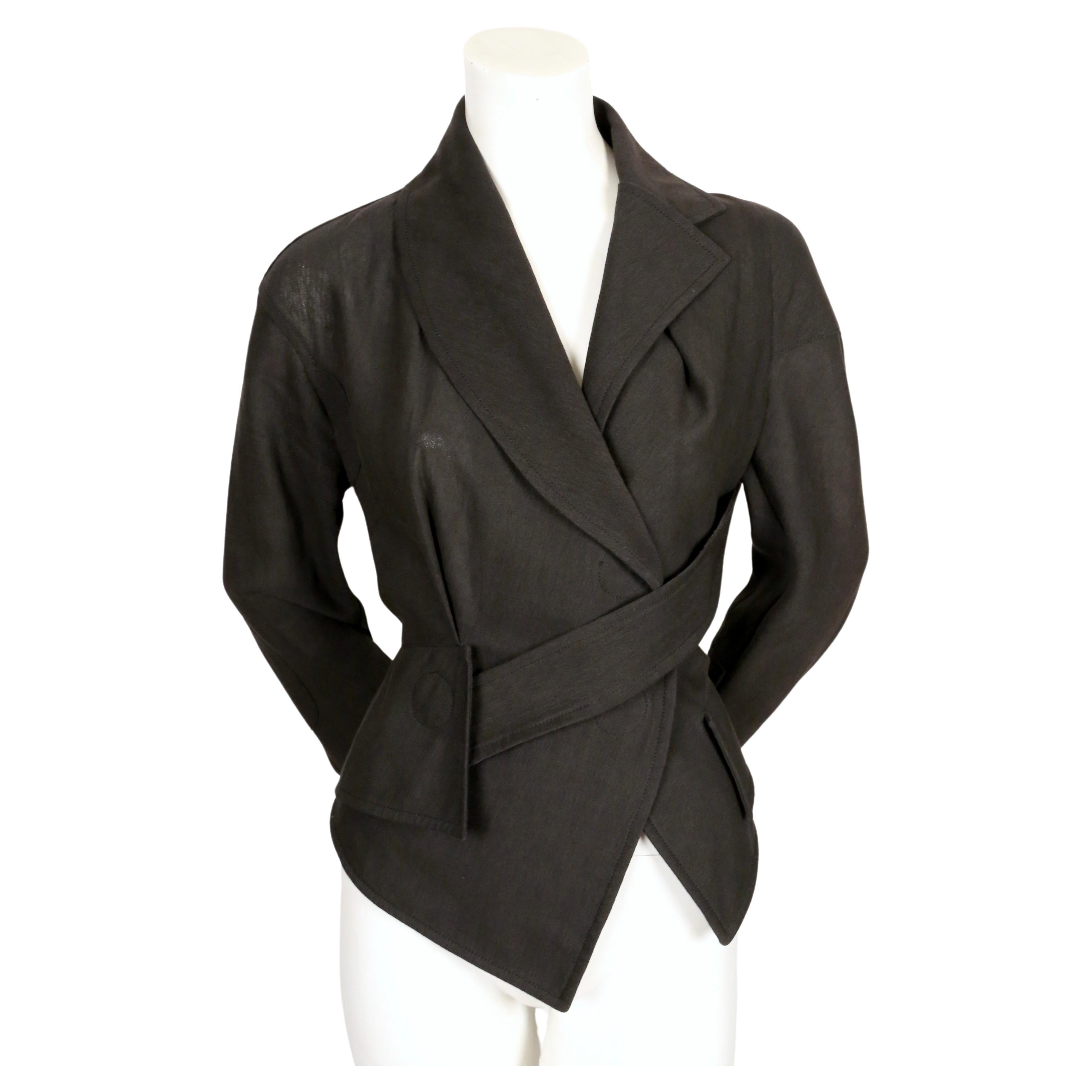Very rare, black, linen jacket designed by Vivienne Westwood dating to the 1990's. Vivienne Westwood gold label which was her top range with very limited numbers made. 

Labeled a UK size 14 which fits small and is best fits a modern US 6-8.