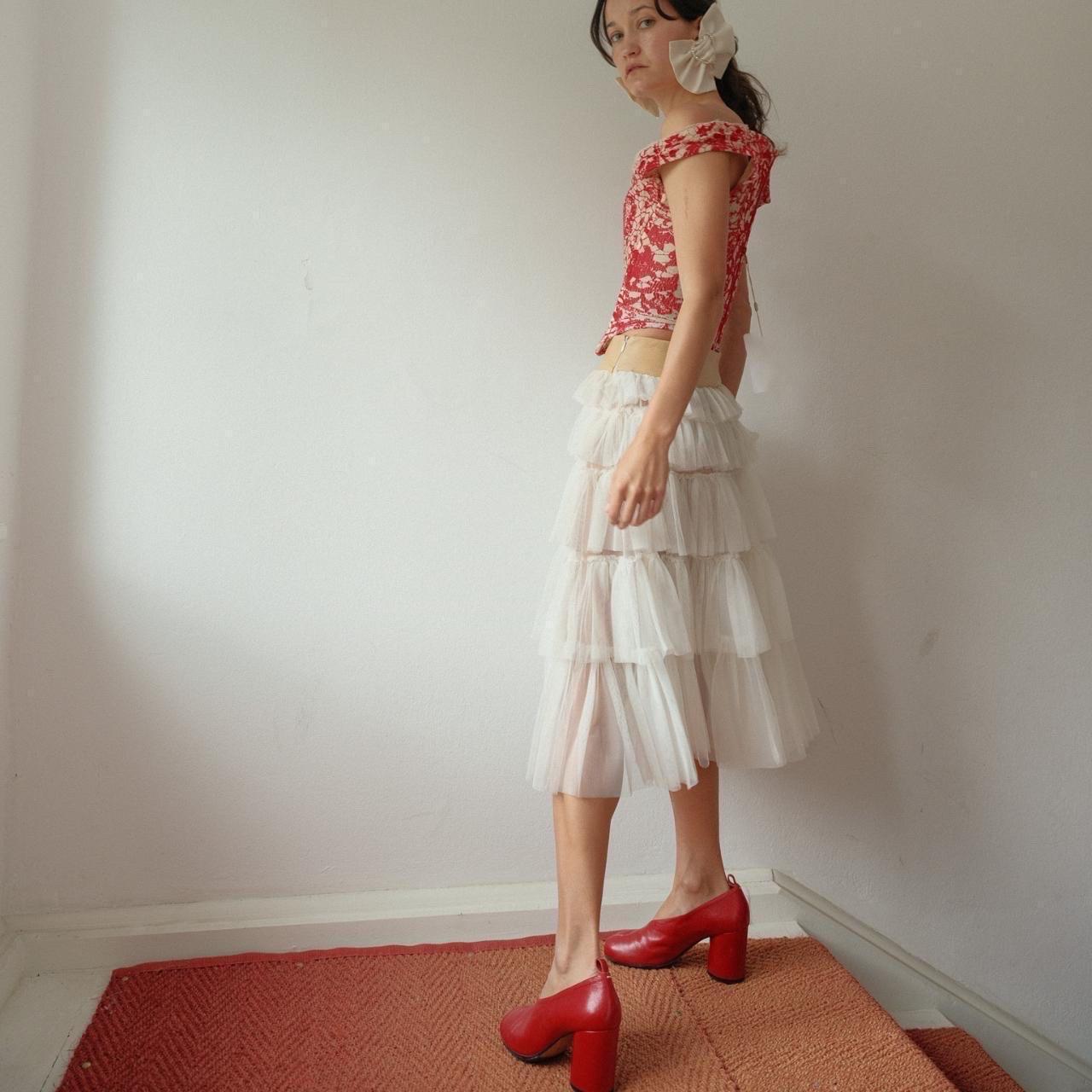 1990s Vivienne Westwood Red Label Ivory and Red Corset

EXCEPTIONAL. Fully boned, red and ivory lace. The perfect unconventional bridal look or event 

Collectors item

Tag size 12 but like all Westwood of this era runs very small more like UK 6-8