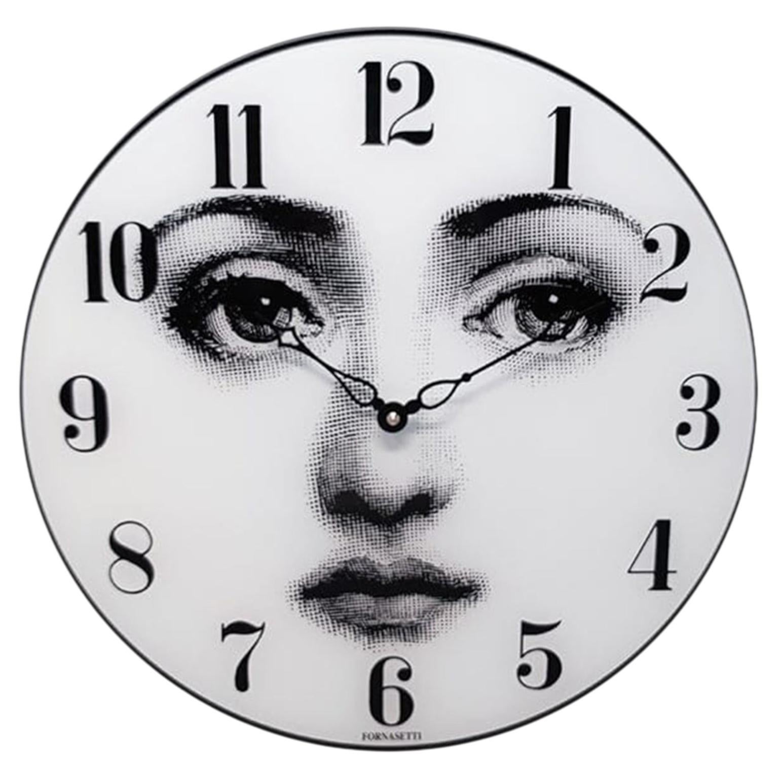 How do I program an Arne Jacobsen Roman table clock?