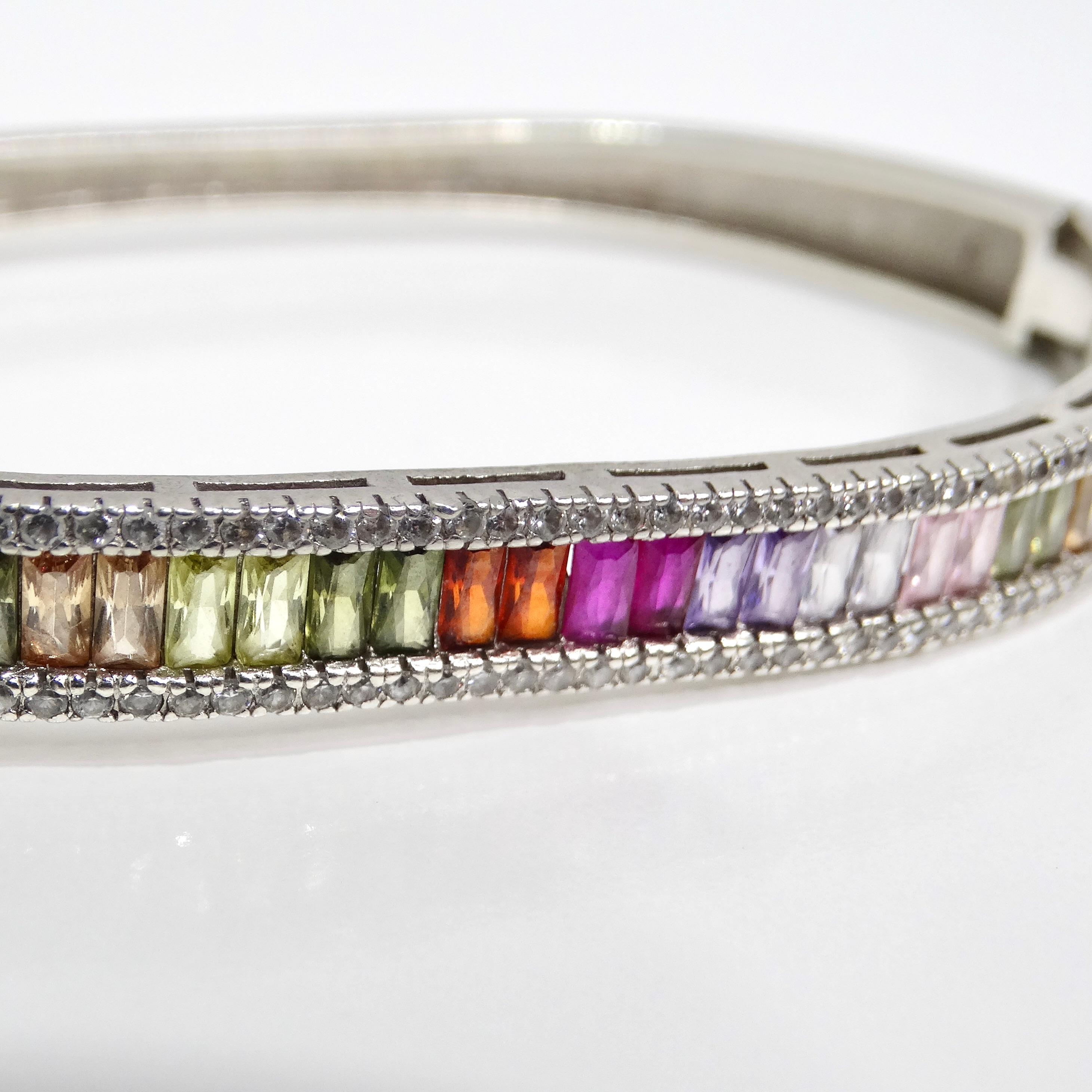 Dive into the vibrant spirit of the 1990s with the Vintage Multicolor Rhinestone Silver Bracelet, a sterling silver clamper bracelet that effortlessly captures the essence of retro glamour. This eye-catching accessory boasts an arrangement of