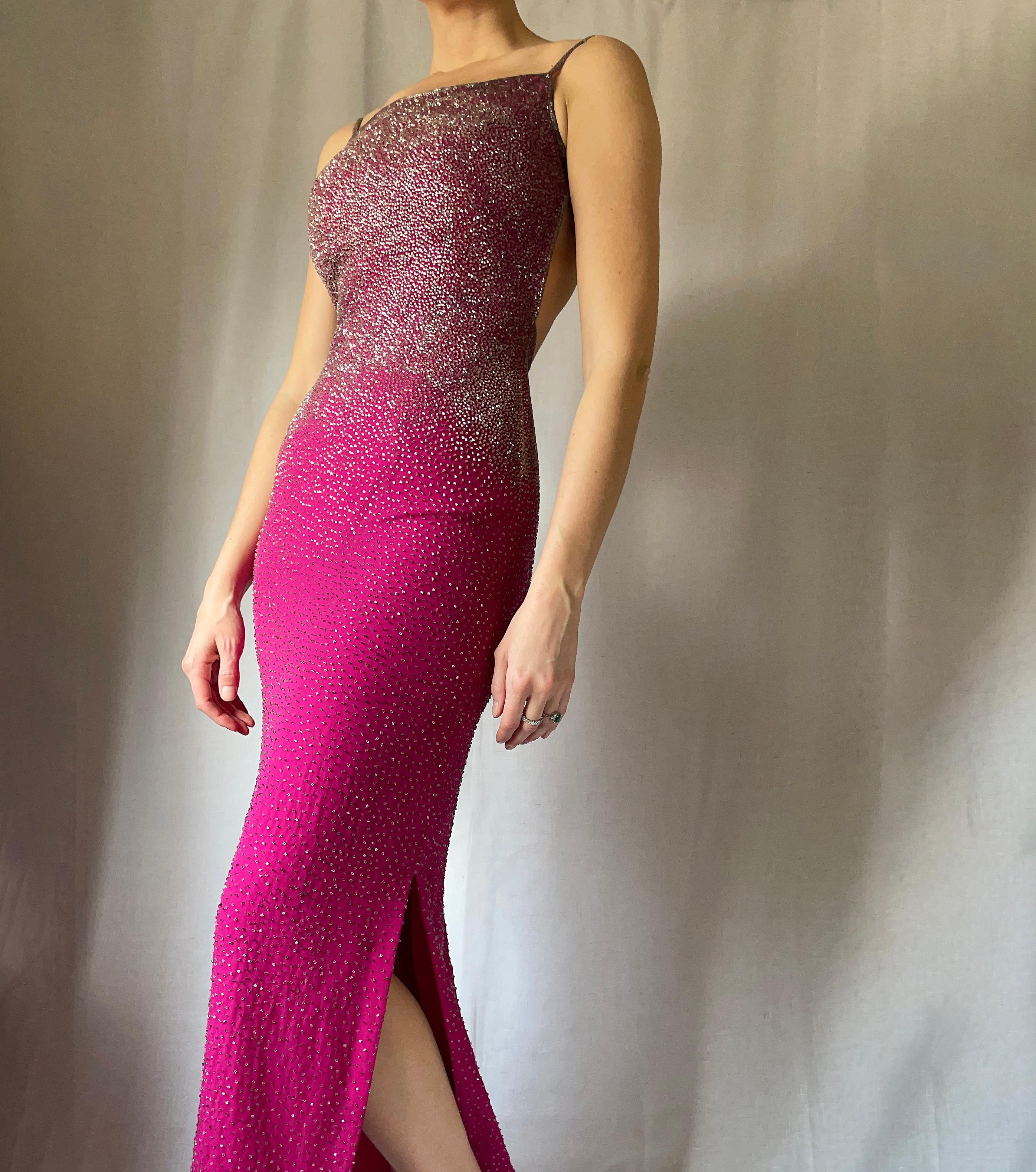 Vintage 1990s Saks Fifth Avenue Label Beaded Backless Gown: This dress is a seriously jaw-dropping moment: equal parts sexy and elegant. Made of 100% silk, it is intricately beaded all-over, with heavier beading and the top and more translucent