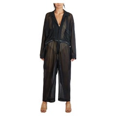 1990S YOHJI YAMAMOTO Tuta nera in fibra di carta trasparente convertibile con zip