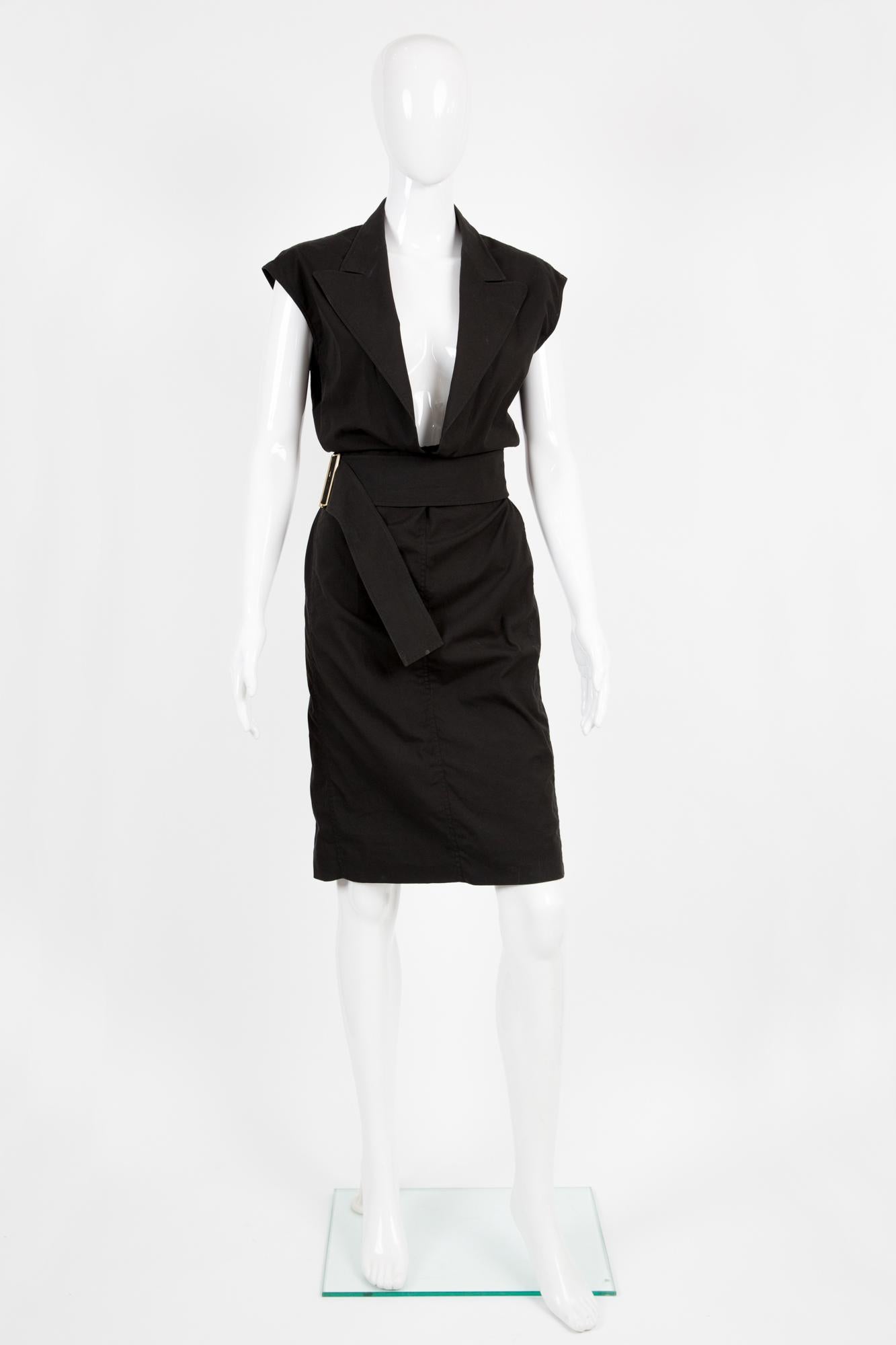 1990s Yves Saint Laurent black cotton sleeveless dress featuring a deep front V neck, a fake wrapped effect, a gold tone buckle. 
100% cotton
In excellent vintage condition. Made in France. 
Estimated size 36fr/ US4/ UK8
We guarantee you will