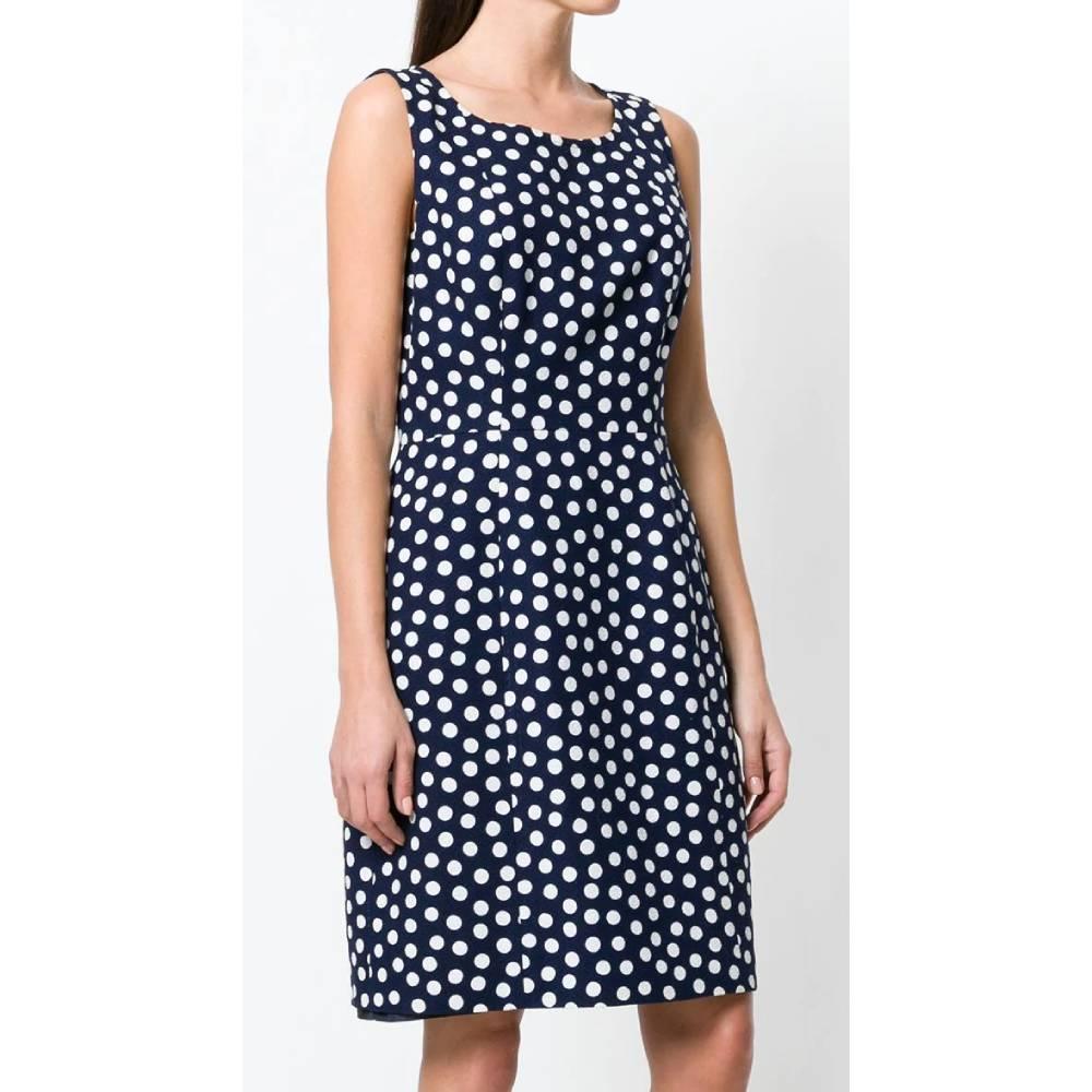 Yves Saint Laurent sleeveless dress in dark blue cotton with white polka dots, round neckline, elastic waist. Knee length.

Years: 90s

Made in France

Size: 42 FR

Linear measures

Lenght: 95 cm
Bust: 45 cm 
Waist: 37 cm 
Hip: 52 cm
Shoulders: 35 cm