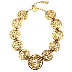 1990's YVES SAINT LAURENT gilt necklace with scroll pattern