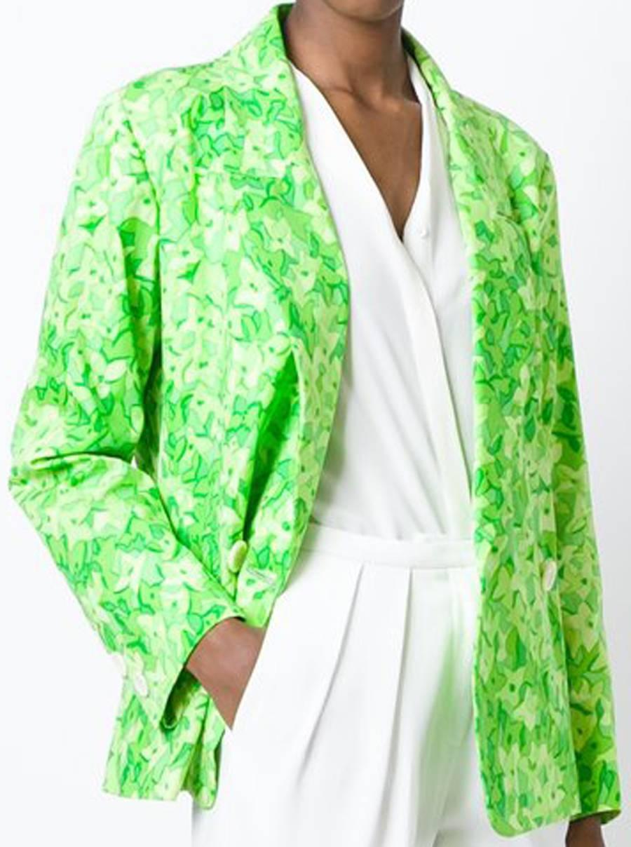 1990s Yves Saint Laurent green cotton floral print blazer featuring apeaked lapels, a double breasted front fastening, front pockets, long sleeves and button cuffs. 
100% cotton
In excellent vintage condition. Made in France. 
Estimated size