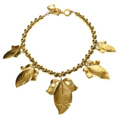 1990's YVES SAINT LAURENT oversized hammered gilt leaf necklace 