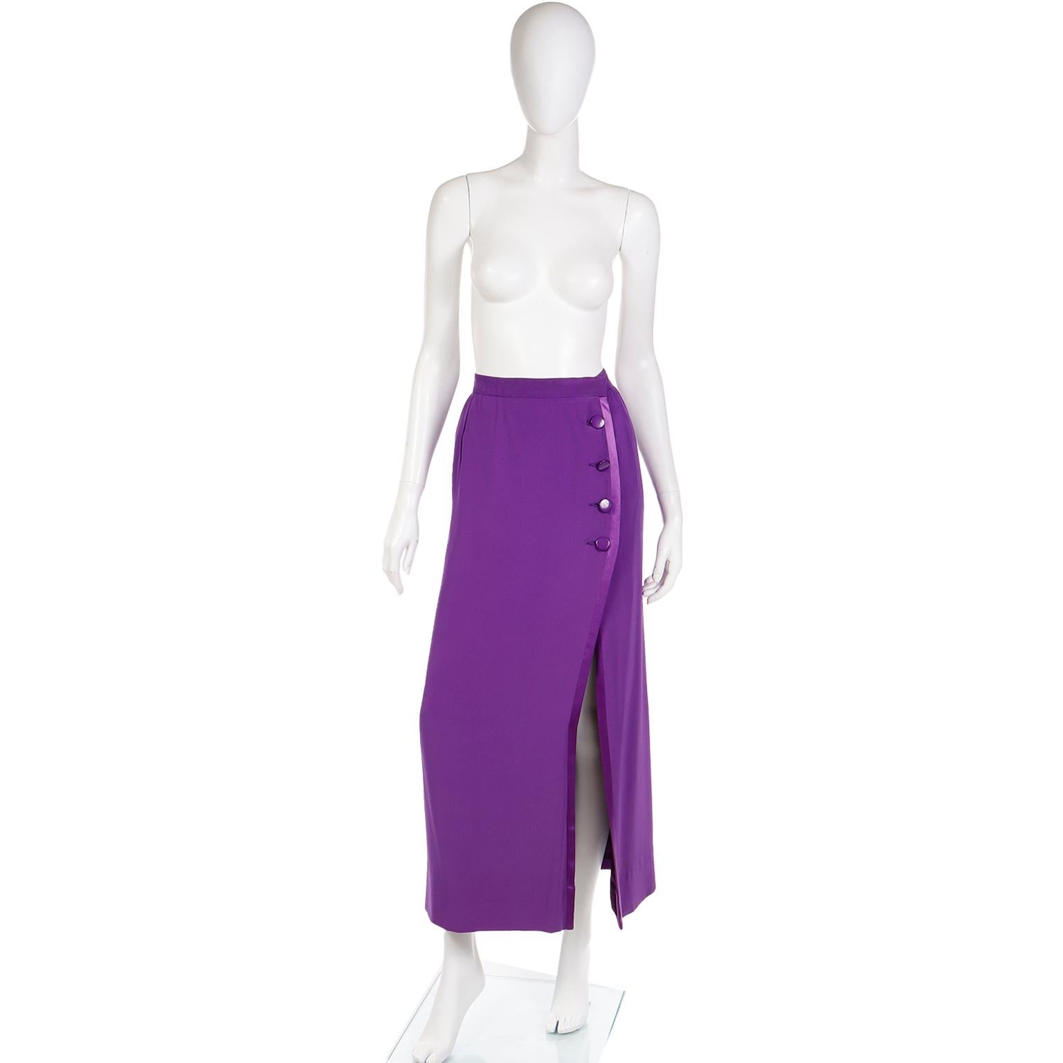 This is a wonderful 1990's vintage Yves Saint Laurent Rive Gauche long skirt in a luxurious purple wool crepe. This great skirt can be worn with a silk top or cropped jacket for an evening out.The skirt is fully lined in dark purple satin and has