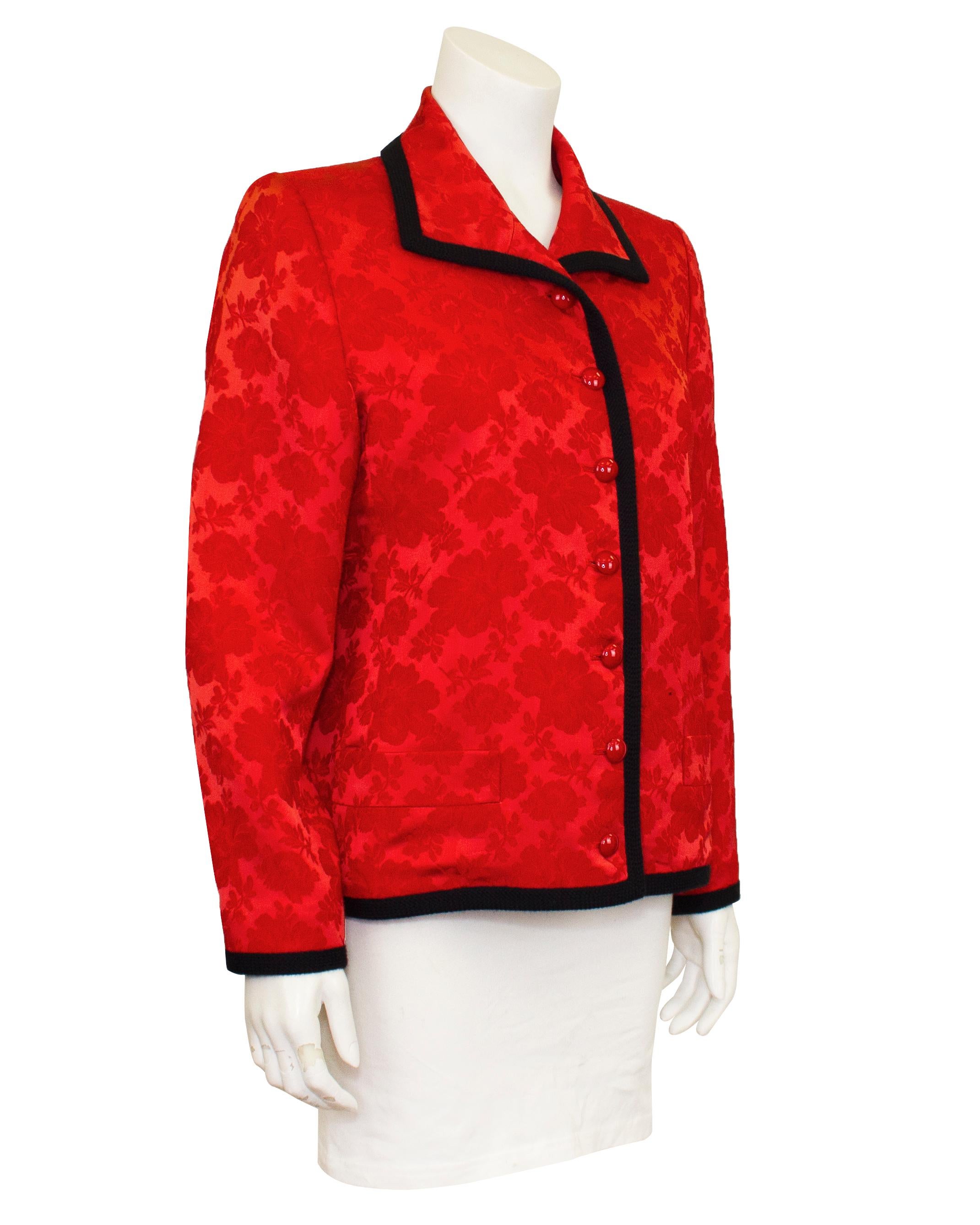 YSL Rive Gauche red silk Damask blazer from the 1990s. Trimmed with a thick black woven webbing. Lined in matching red silk, the blazer buttons up the front with shiny and smooth rounded 'cabochon' looking buttons. In excellent condition, marked a