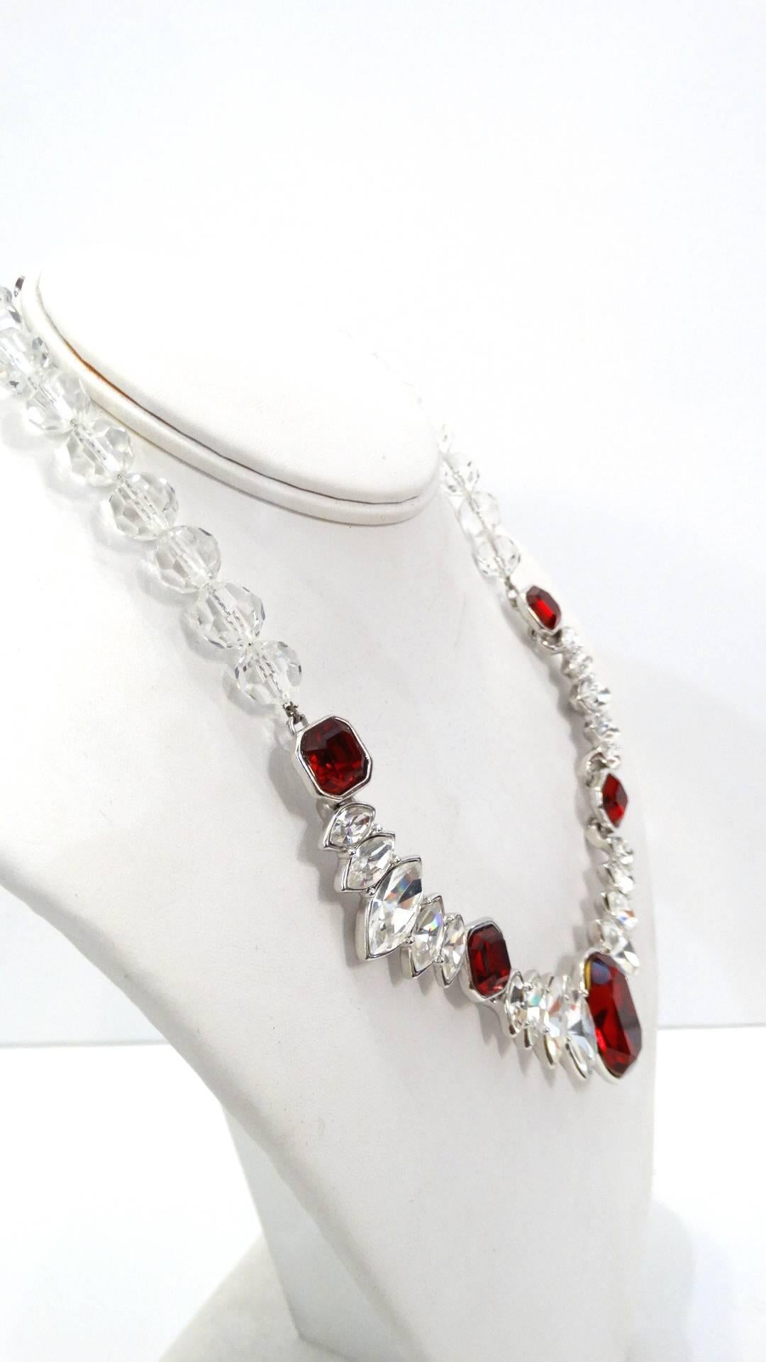 Amazing 1990s Yves Saint Laurent rhinestone necklace! Made of a quality silver metal, encrusted with marquise cut rhinestone gems and large faux rubies. Clear crystal beads along the back of the neck with hook and chain closure. Sits close to the