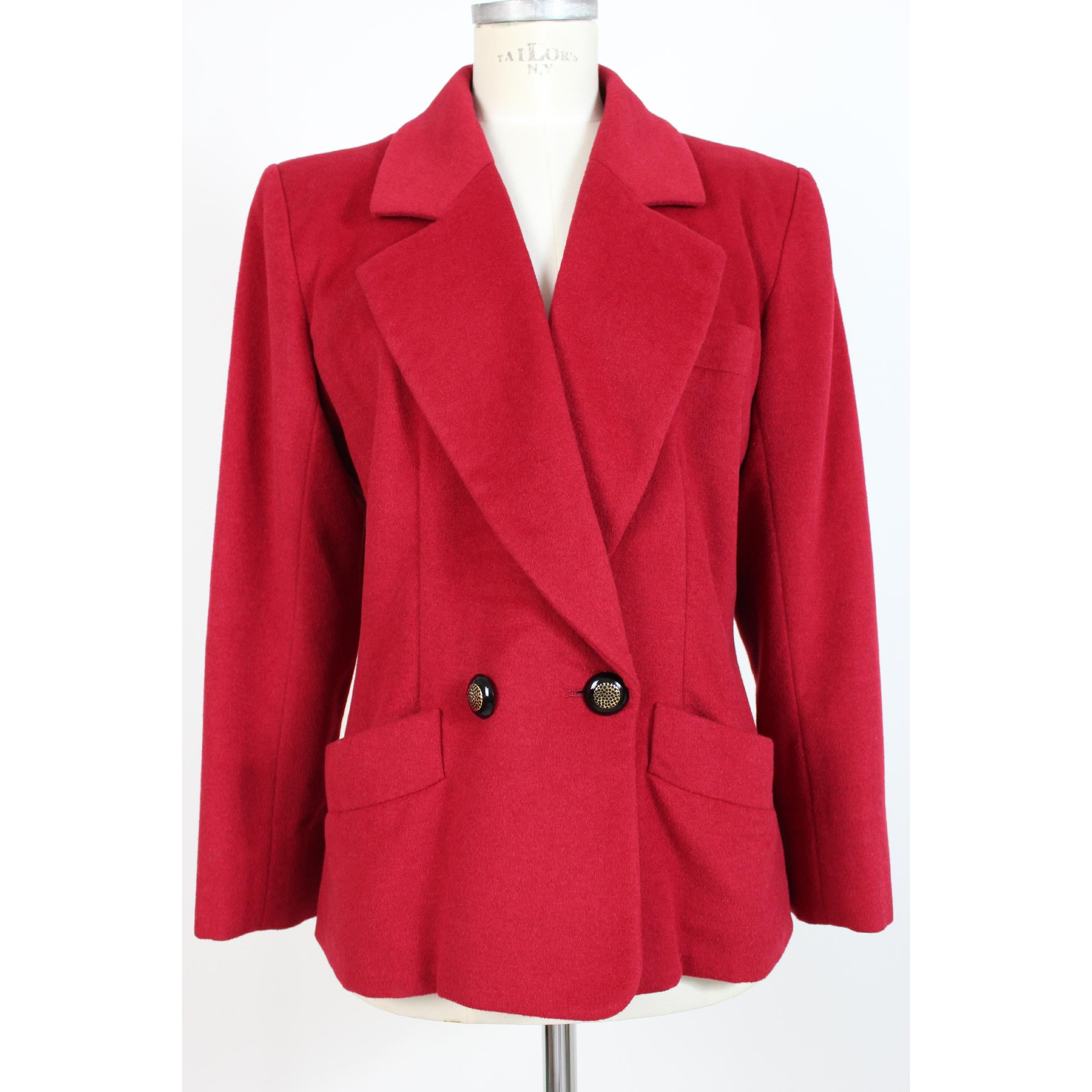 Yves Saint Laurent vintage women's jacket, double-breasted red color, jewel button closure, 70% wool 15% cashmere 15% angora. 1990s. Made in France. Excellent vintage conditions.

Size: 46 It 12 Us 14 Uk

Shoulder: 46 cm

Bust / Chest: 56