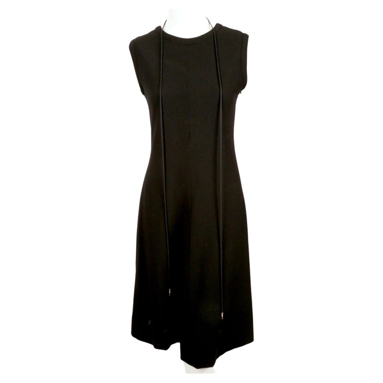 Black 1990's YVES SAINT LAURENT rive gauche black wool dress with lace up back For Sale