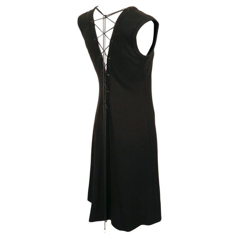 1990's YVES SAINT LAURENT rive gauche black wool dress with lace up back For Sale