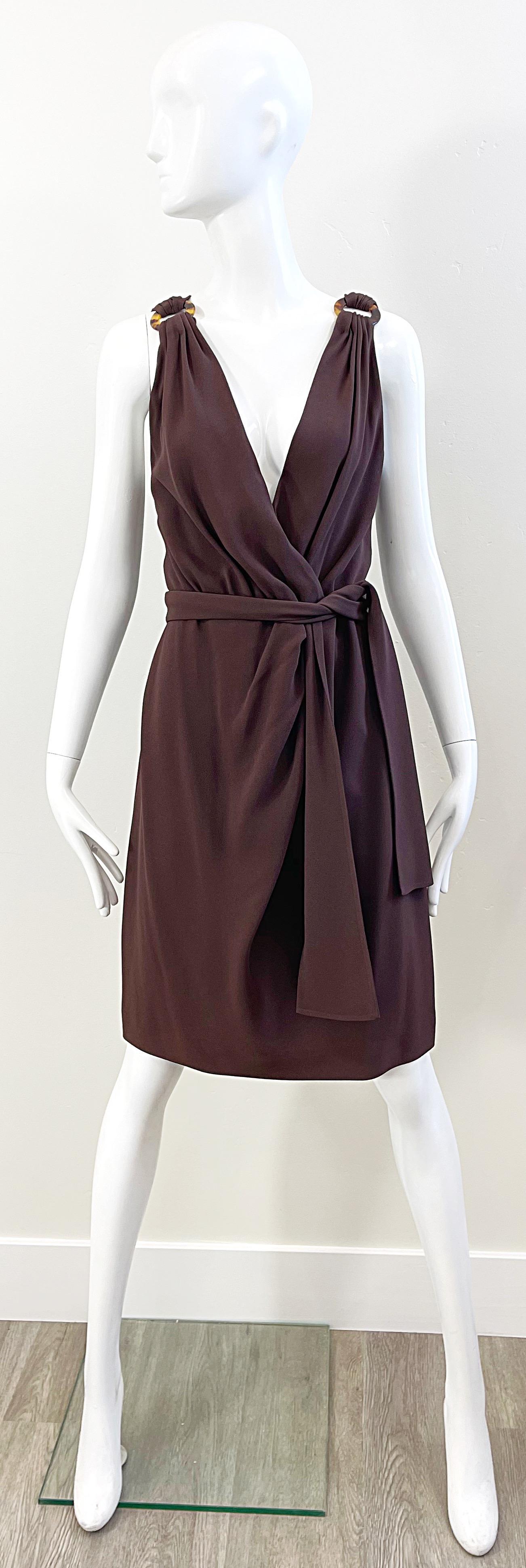 Sexy 1990s YVES SAINT LAURENT Rive Gauche chocolate brown plunging dress and sash belt ! Features faux tortoise shell rings at each shoulder. Wrap style with hidden hook-and-eye closures and snap. Soft rayon blend fabric drapes beautifully against