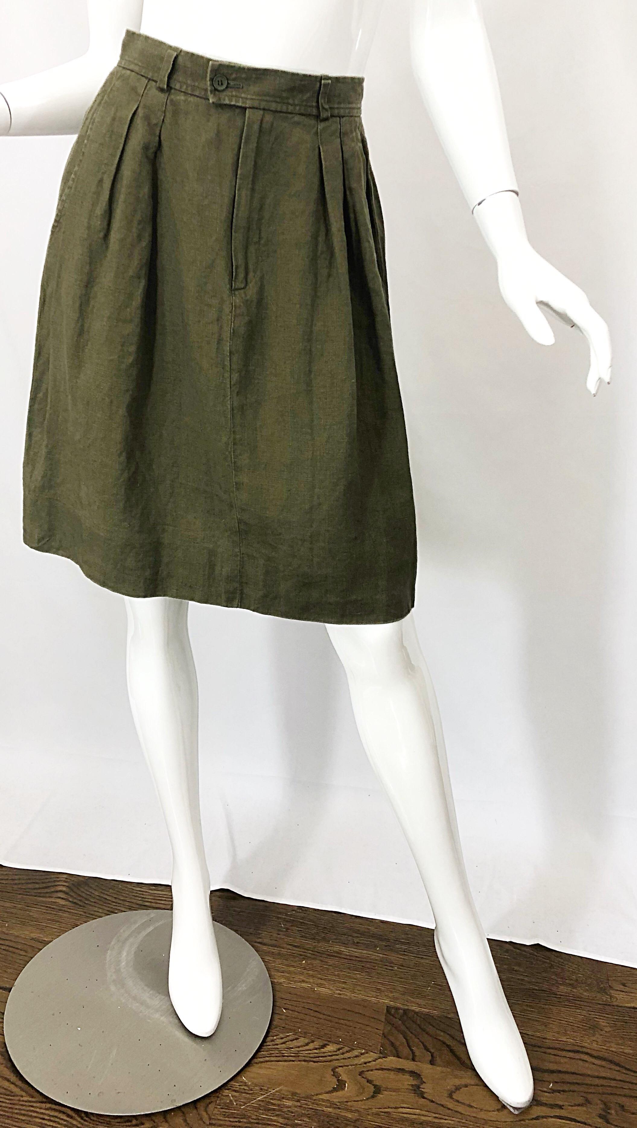 1990s YVES SAINT LAURENT YSL Rive Gauche army green linen skirt! Features the perfect color green that can easily be your new neutral. Super soft linen fabric. Flattering pleats at each side of the front waist. Button closure at waistband with