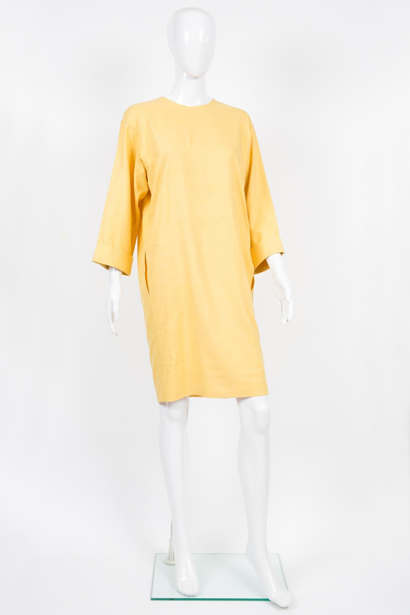 1990s Yves Saint Laurent yellow silk dress featuring 3/4 sleeves, sides seams pockets, an oversized volume. 
100% silk
In excellent vintage condition. Made in France. 
Estimated size 36fr/ US4/ UK8
We guarantee you will receive this gorgeous item as