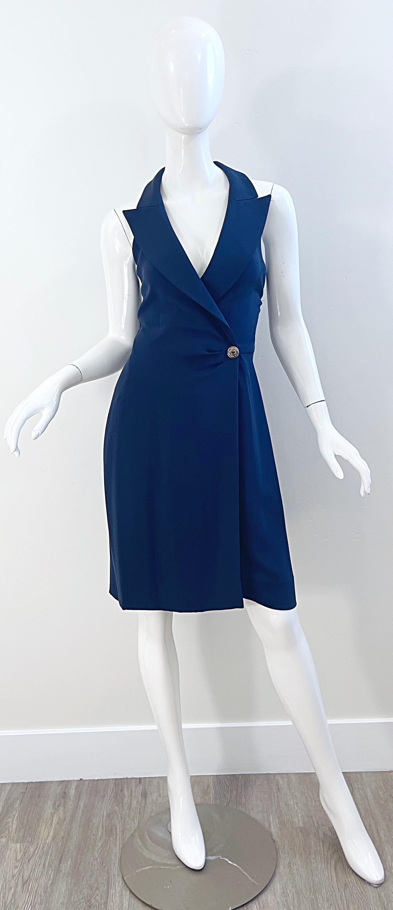 Chic 1990s YVES SAINT LAURENT Rive Gauche navy blue silk tuxedo style wrap dress ! Features a tailored bodice with signature YSL exaggerated lapels. Wrap style with silver button at the side and hidden hook-and-eye closure. Fully lined. The perfect