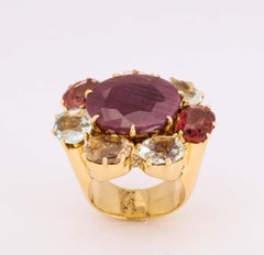 1990's H .Stern Large Faceted Ruby Hesonite Garnet Aquamarine Gold Cocktail Ring