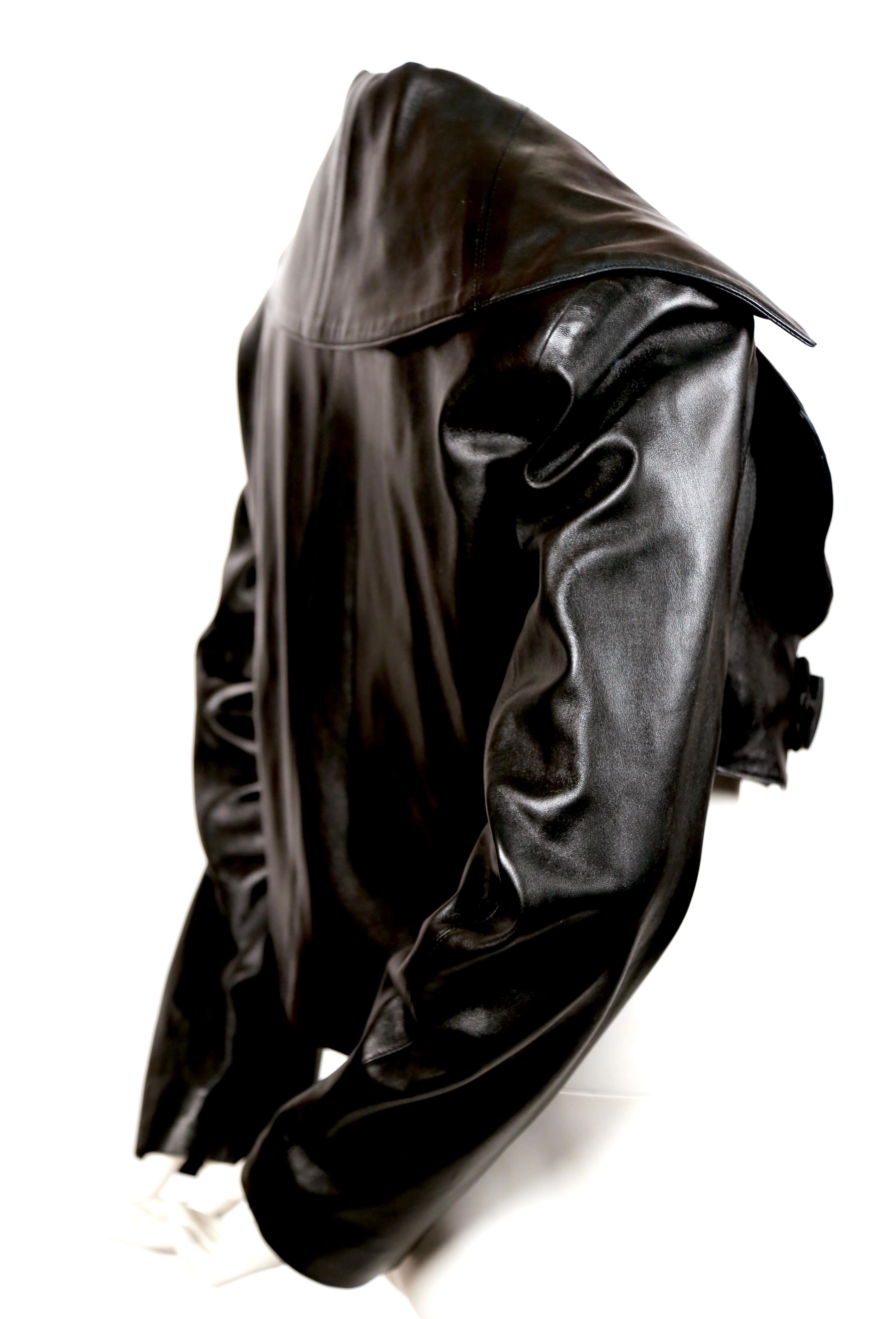Jet black butter soft leather jacket with shawl collar and frog closure designed by Azzedine Alaia dating to fall of 1991. Fits shorter in the front than the back. Labeled a FR 36. Approximate measurements: bust 36