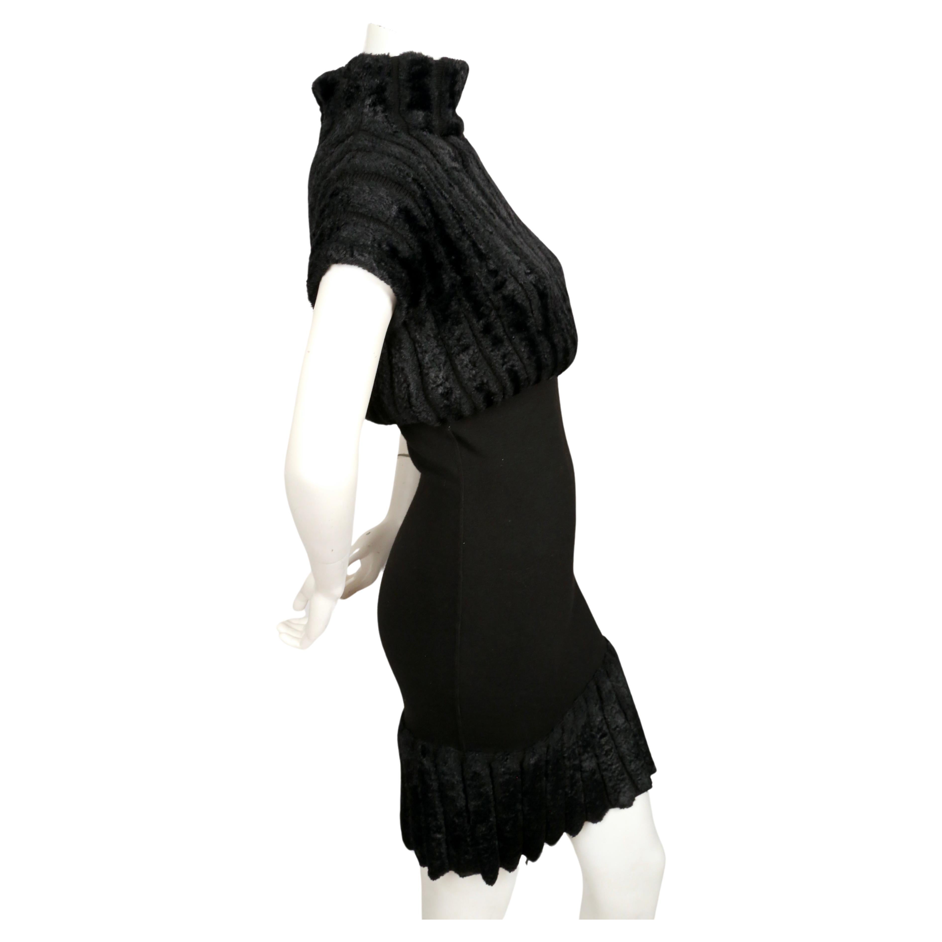 Very rare, jet-black, ribbed chenille dress from Azzedine Alaia dating to 1991. Labeled a size S. Approximate measurements (unstretched): bust 32