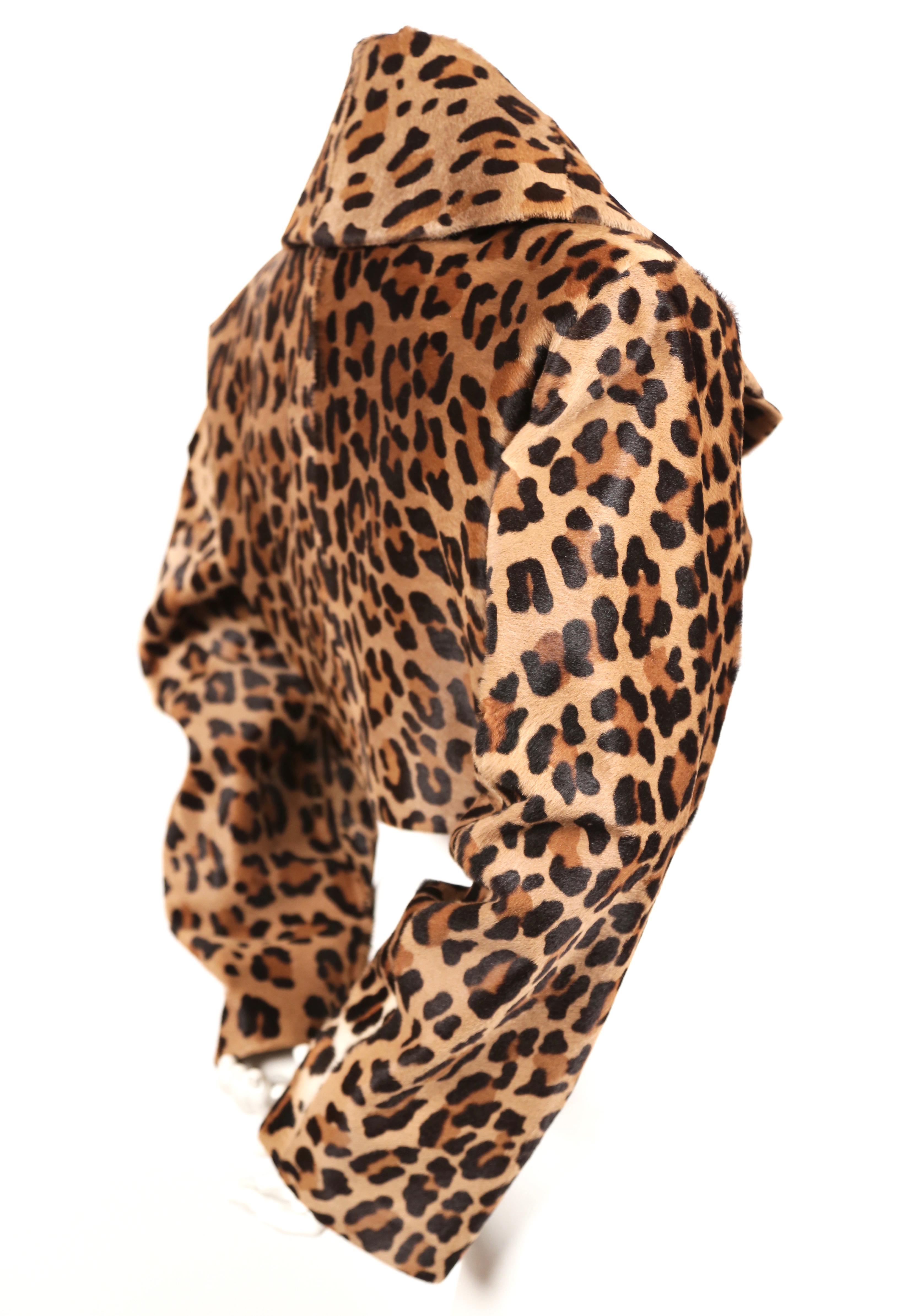 Extremely rare leopard printed calf fur jacket with decorative black frog closure designed by Azzedine Alaia dating to fall of 1991 exactly as seen on the runway. Labeled a French size 40 although there is some flexibility due to the cut.