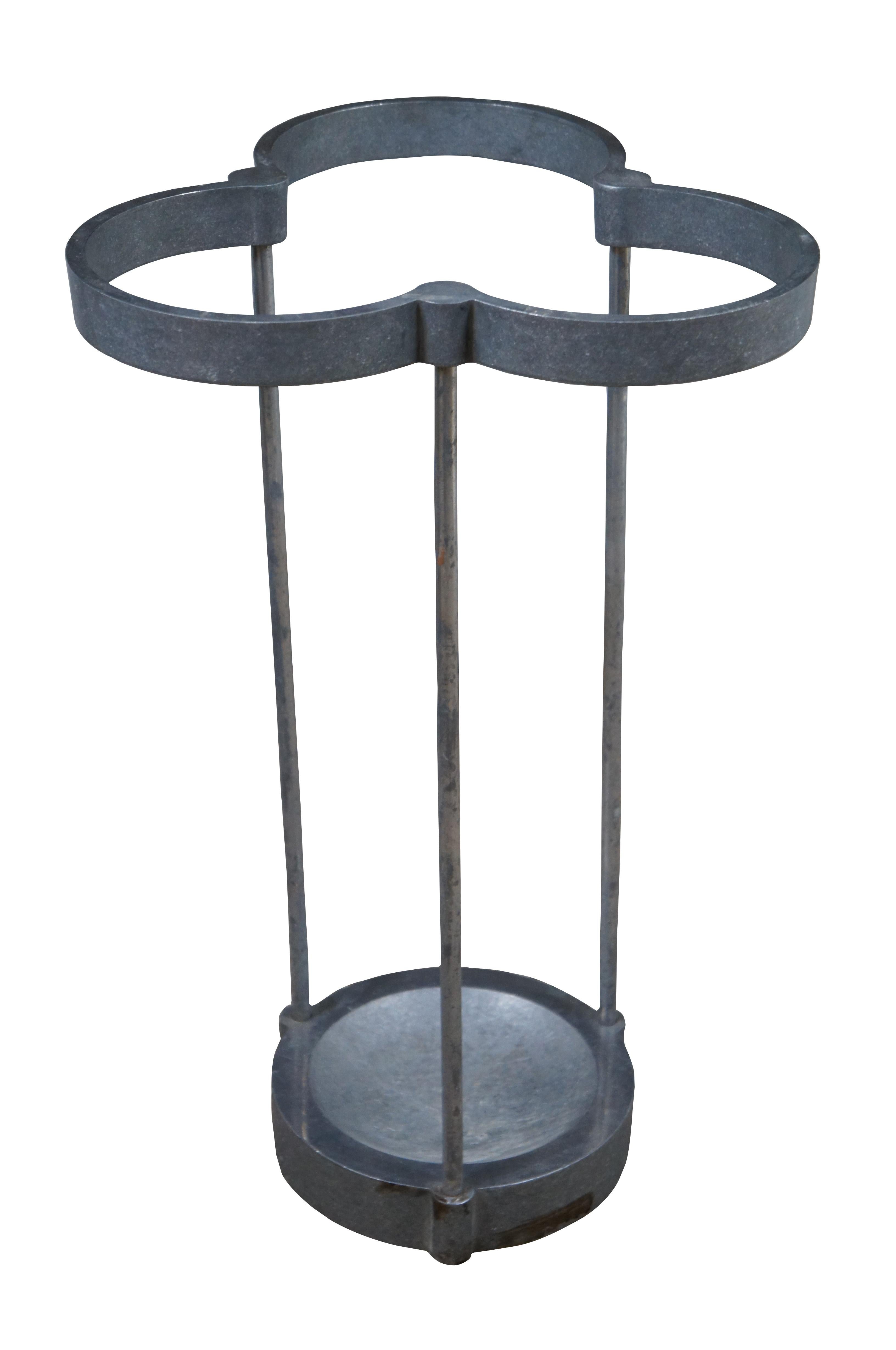 Vintage Modern 1991 recycled aluminum post modern style umbrella or cane stand featuring a trefoil or clover shaped upper rim and a round base. Produced by EFM Designs for the Museum of Modern Art, designed by Emanuela Frattini Magnusson & Carl