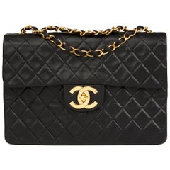 Chanel - Sac à rabat vintage Maxi Jumbo XL en cuir d'agneau matelassé noir, 1991
