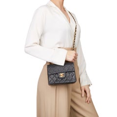 1991 Chanel Black Quilted Lambskin Vintage Mini Flap Bag