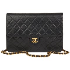 1991 Chanel Black Quilted Lambskin Vintage Mini Flap Bag