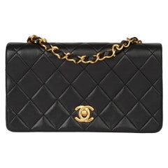 1991 Chanel Black Quilted Lambskin Vintage Mini Flap Bag