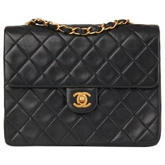 1991 Chanel Black Quilted Lambskin Vintage Mini Flap Bag