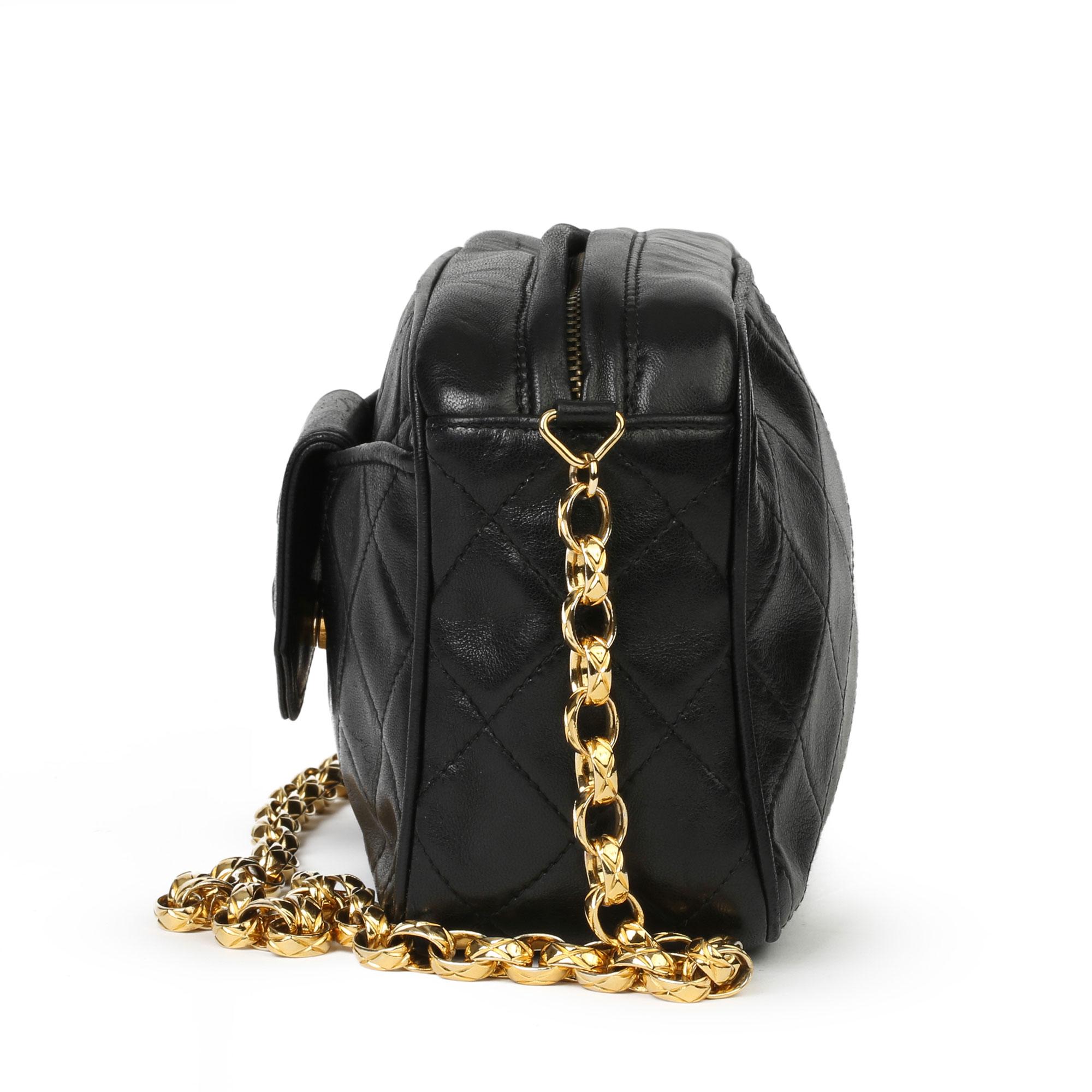 CHANEL
Black Quilted Lambskin Vintage Timeless Fringe Camera Bag

Xupes Reference: HB3909
Serial Number: 1732164
Age (Circa): 1991
Accompanied By: Chanel Dust Bag, Box, Authenticity Card
Authenticity Details: Authenticity Card, Serial Sticker (Made