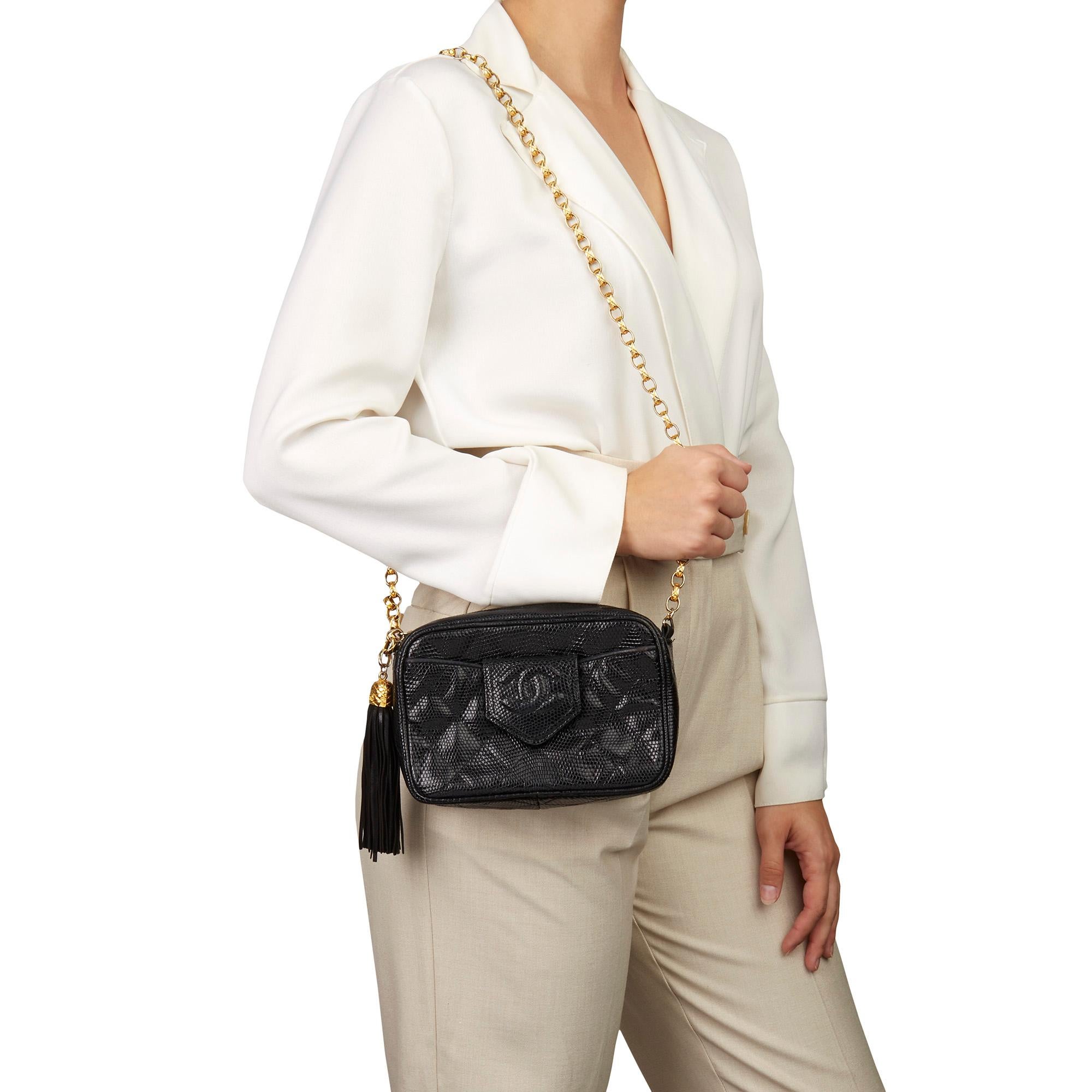 CHANEL
Black Quilted Lizard Leather Vintage Camera Bag

Xupes Reference: HB3011
Serial Number: 1727417
Age (Circa): 1991
Accompanied By: Chanel Dust Bag
Authenticity Details: Serial Sticker (Made in Italy)
Gender: Ladies
Type: Shoulder,